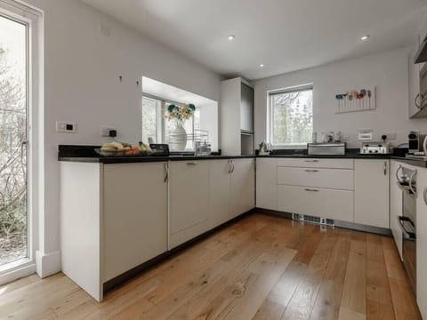 Kitchen includes fridge freezer and washer dryer