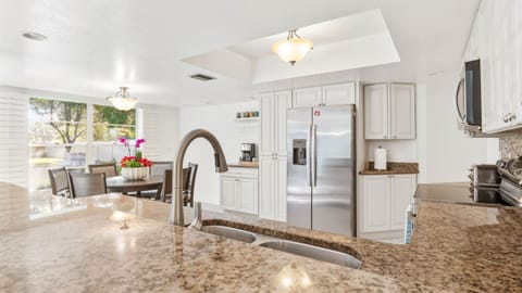 This kitchen is a dream with our marble counter tops and state-of-the-art appliances