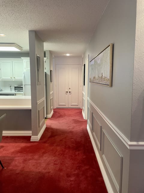 Hallway leads to 2 main floor bedrooms & full bath.