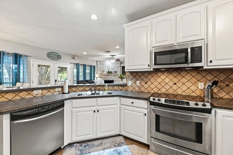 Bake, cook, or have your meals prepared together in our spacious kitchen packed with complete appliances