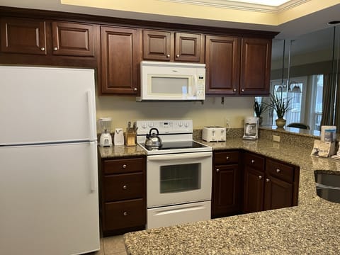 Full Kitchen with Stove, Refrigerator, Coffee Maker, Toaster, Dishwasher