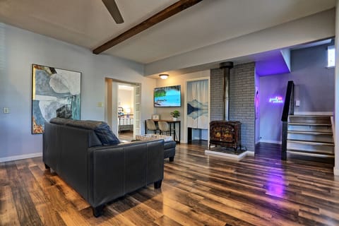 Leather couch with king sofa bed sleeps two. Fireplace is decorative only and does not provide heat.