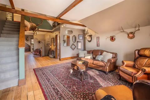 Warm, rustic touches create a cozy urban cabin feel in this Milwaukee loft