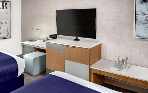 Plug in and get focused at the sleek in-room desk.