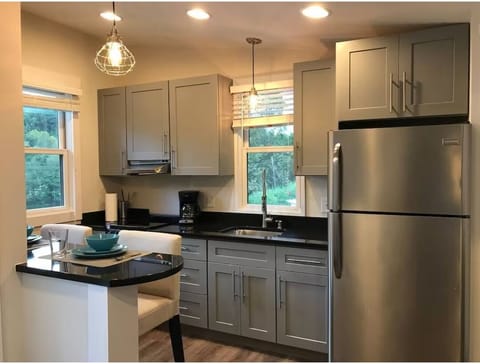 Full Kitchen with Bar Top Seating