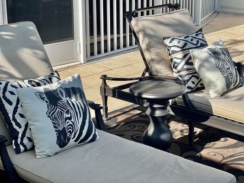 Lounge chairs are provided with oversized beach towels.