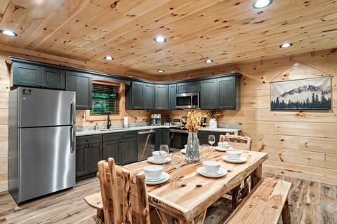 large custom wood table, room for 8.