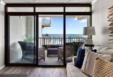 Ocean-facing living room opens to private balcony