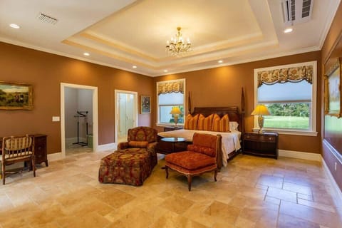 - Experience tranquility in this spacious master bedroom retreat of the home in Naples, Florida
- Sink into luxury with plush double bedding with cozy linens and elegant decor
- Enjoy plenty of room to unwind and relax after a day of adventures