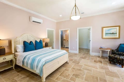 - Relax and recharge in meticulously designed bedroom of the suite in Naples Florida
- Features queen size bed for restful nights and 2 walk-in closets for all your belongings
- Well-appointed bedroom featuring neutral tones for a calming atmosphere