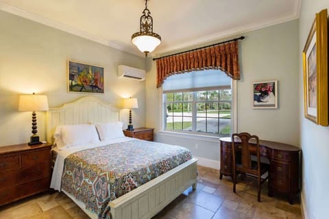Suite 08B - Unwind in the spacious bedroom of the suite in Naples Florida
- A cozy retreat with a plush queen size bed, ideal for unwinding and enjoying a restful night's sleep
- Stunning views from the window and a writing desk for convenience