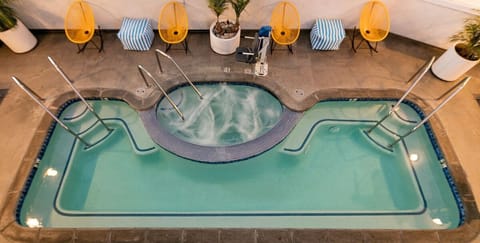 Cool off with a quick dip and bubbling spa jets.