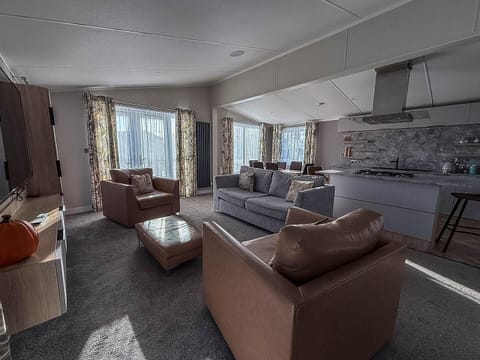 Spacious living room with cozy seating and natural light