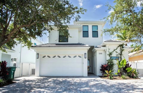 Exterior to Home; 2 Car Garage; Courtyard Home with Privacy Fence; Walk to Vanderbilt Beach; Minutes from Mercato!