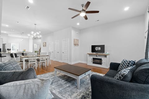 Living Room w/ Indoor Electric Fireplace & Dining Area