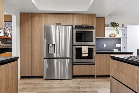 Kitchen features modern appliances.