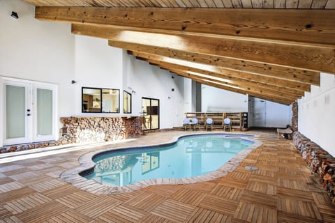 Welcome to Honeypot! Lakefront home with large indoor pool to enjoy a swim any time of the year.