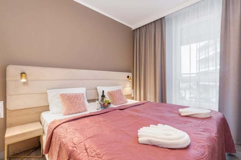 Bedroom with a double bed and wardrobe