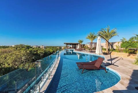 Tulum City Apartments - M-222
Alberca infinity en el rooftop en areas comunes
