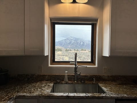 view of Taos Mountain from the kitchen window