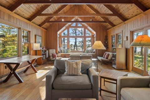 An abundance of light flows through the large windows in the family room 
