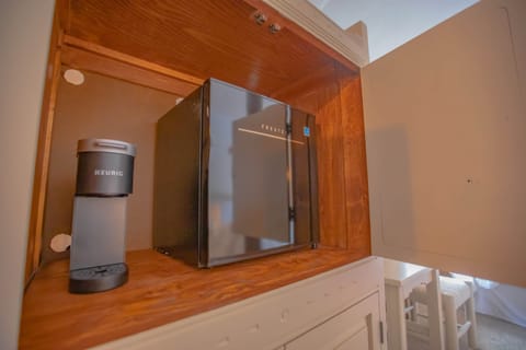 Coffee machine and mini fridge.