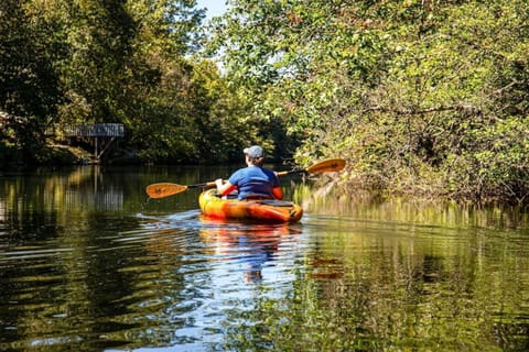 Behind A Lil Bit O Heaven, there is a trail leading to the East Fork of The Little River where the community offers kayaks to paddle out to Lake Lahusage.
