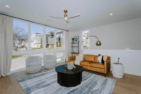 Dazzling living room space and private workspace