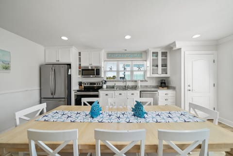 Large dining room table and chairs. Easily seating 8.