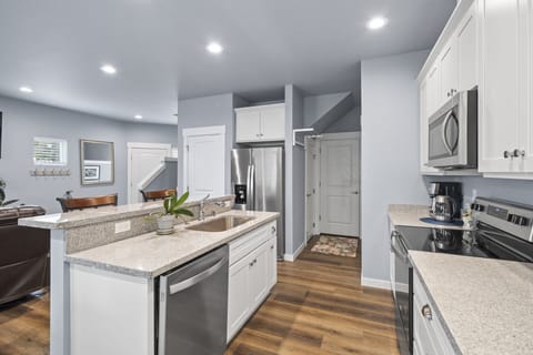 Lots of counter space and Stainless Steel matching appliances. Built in Micro.