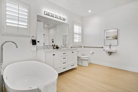 Fully remodeled ADA compliance master bathroom.