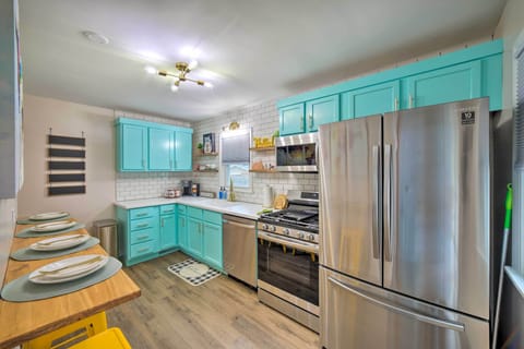 Counter height seating for four & a fridge large enough for all your goodies!