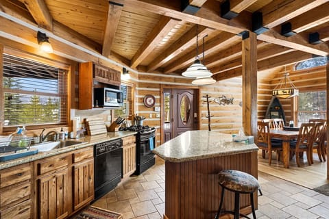 Fully stocked large kitchen and dining area