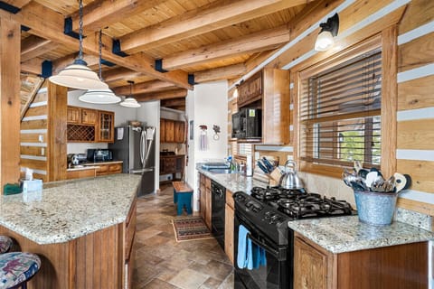 Fully stocked large kitchen and dining area