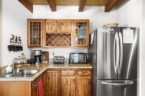 Fully stocked large kitchen and dining area