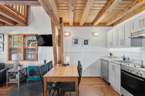 Share meals and play boardgames at the dining table which accommodates four