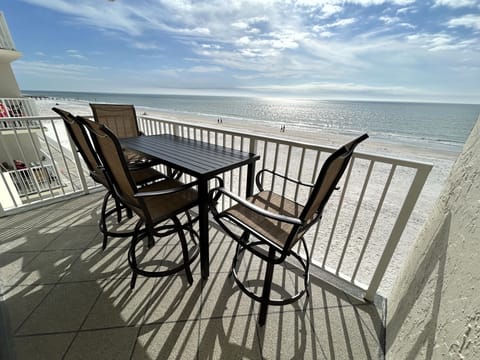 Private beachfront balcony with new patio furniture. Direct ocean views!