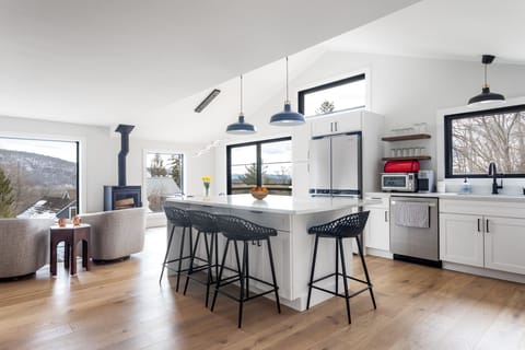 Massive island for prep and entertaining.  Designer kitchen. 