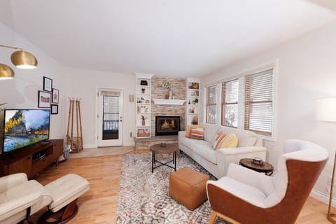 Living Room with Fireplace, Sleeper Sofa, and TV