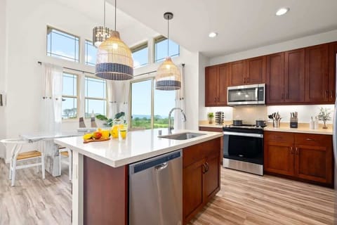 Sleek modern kitchen with inviting dining setup