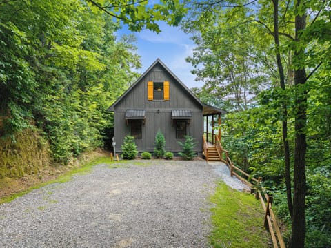 Bright entryway and a deck with sweeping mountain scenery await your stay.