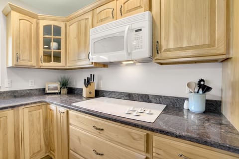 Range, pull out drawers below with all the cooking utensils you could need! 