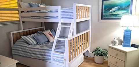 NEW-guest bedroom with bunk style bedding. One twin top and one full on the bottom.