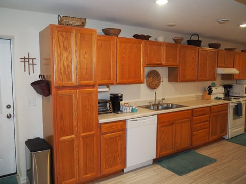 KITCHEN:  Very convenient and modern kitchen with all appliances including a dishwasher, microwave, toaster oven, and Keurig coffee maker.