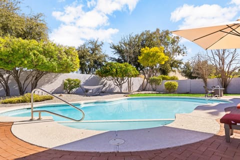 Huge pool and yard area with a deck and sunloungers for everyone to enjoy