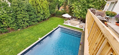 Deck view of pool and lounge area.