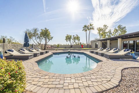Heated pool with 10 lounge chairs to lay out, relax, and enjoy the AZ sun!