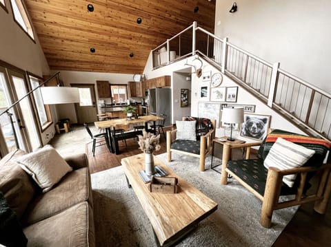 Open living, dining, and kitchen area 