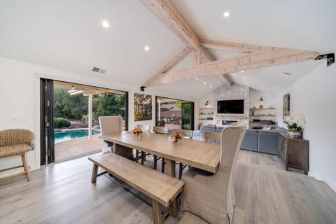 Sunlit dining area with poolside views for memorable meals