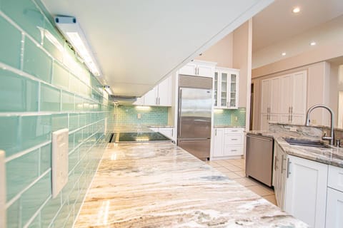 Glass subway tile & granite is pleasing to the eye!